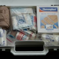 first aid kit, help, suitcase, white, emergency, pavement, first aid, red cross box, container, bandages, first aid bag, sanitary napkins, emergency doctor, ambulance kit, first aid, first aid, first aid, first aid, first aid